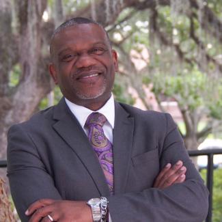 Dr. Gregory J. Harris